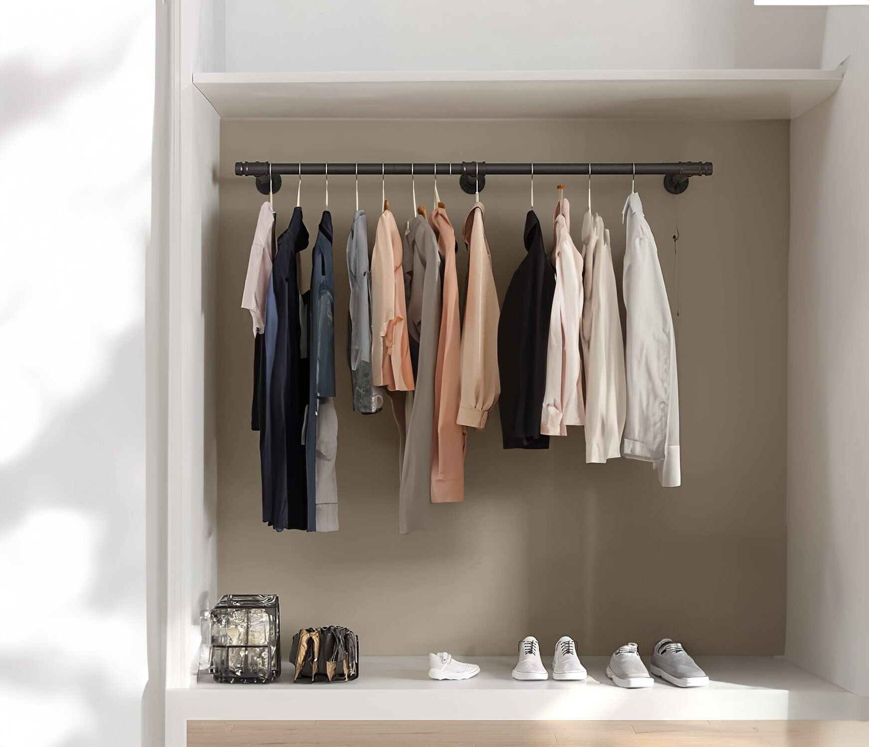Retro wall-mounted hanging clothing rack, showcasing its design and capacity to hold many pieces of clothing.