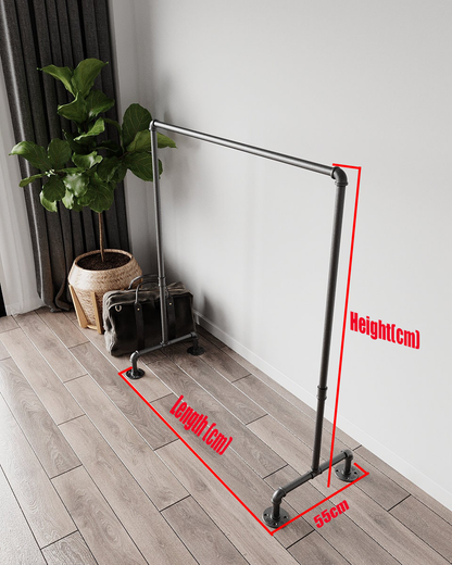 Portable and Collapsible Pipe Clothes Rail, a freestanding rack with hanging garments, highlighting its convenient and space-efficient design.
