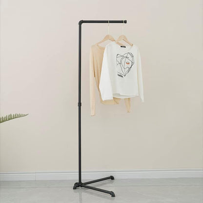 FODUE Industrial Pipe Clothes Rack, a free-standing gold finish hanging rod, suitable for organized closet storage without mounting or screws.