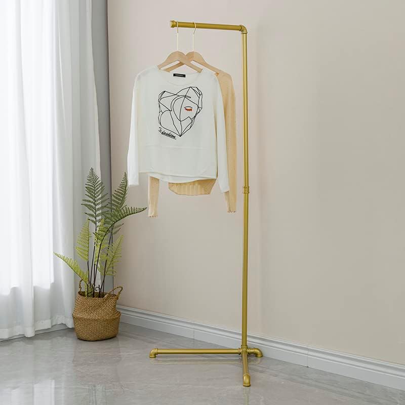 FODUE Industrial Pipe Clothes Rack, a free-standing gold finish hanging rod, suitable for organized closet storage without mounting or screws.