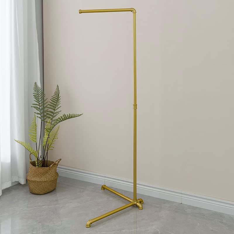 FODUE Industrial Pipe Clothes Rack, a free-standing gold finish hanging rod, suitable for organized closet storage without mounting or screws.