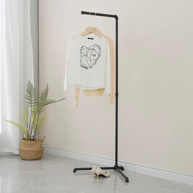 FODUE Industrial Pipe Clothes Rack, a free-standing gold finish hanging rod, suitable for organized closet storage without mounting or screws.