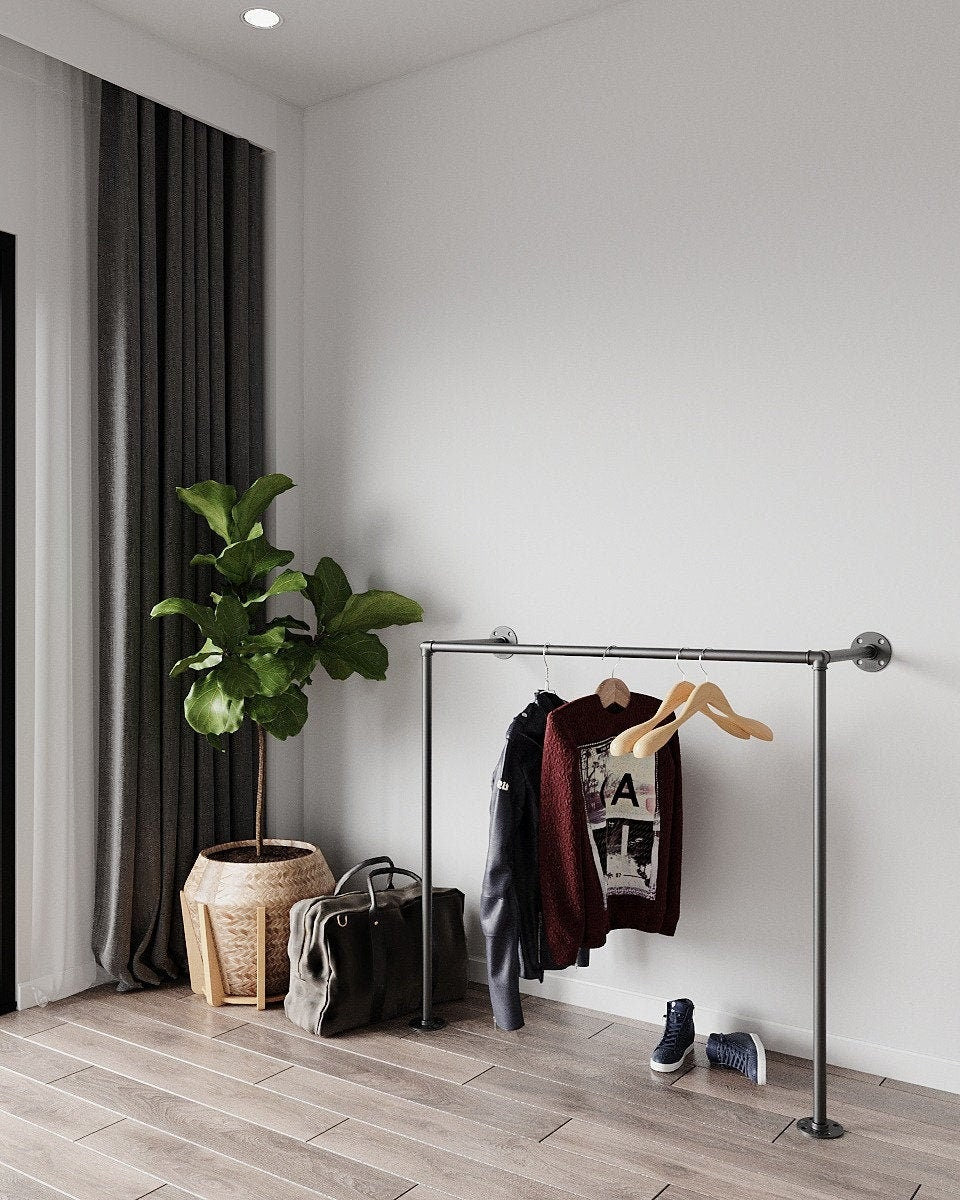 "Argus Clothes Rack, a versatile and retro clothes rack and coat hanger, suitable for wall or floor mounting."