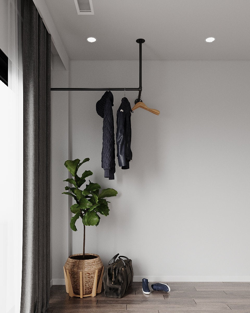 Sleek Ceiling Corner Clothes Racking system, suspended from the ceiling, offering a modern and space-saving solution for clothing storage.