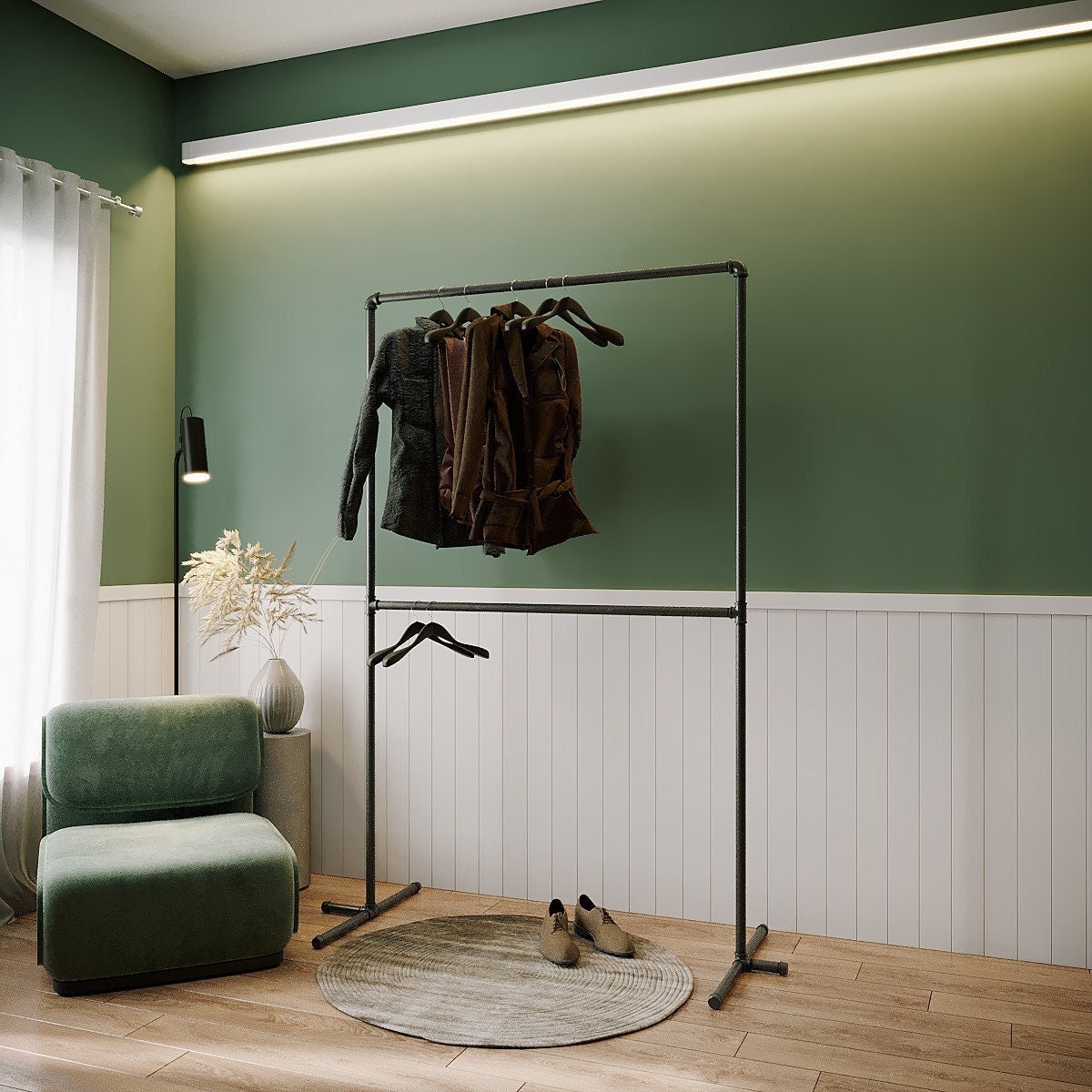 Aspa Clothing Rack, a versatile and collapsible two-level free-standing pipe clothes rack, suitable for retail or home use.