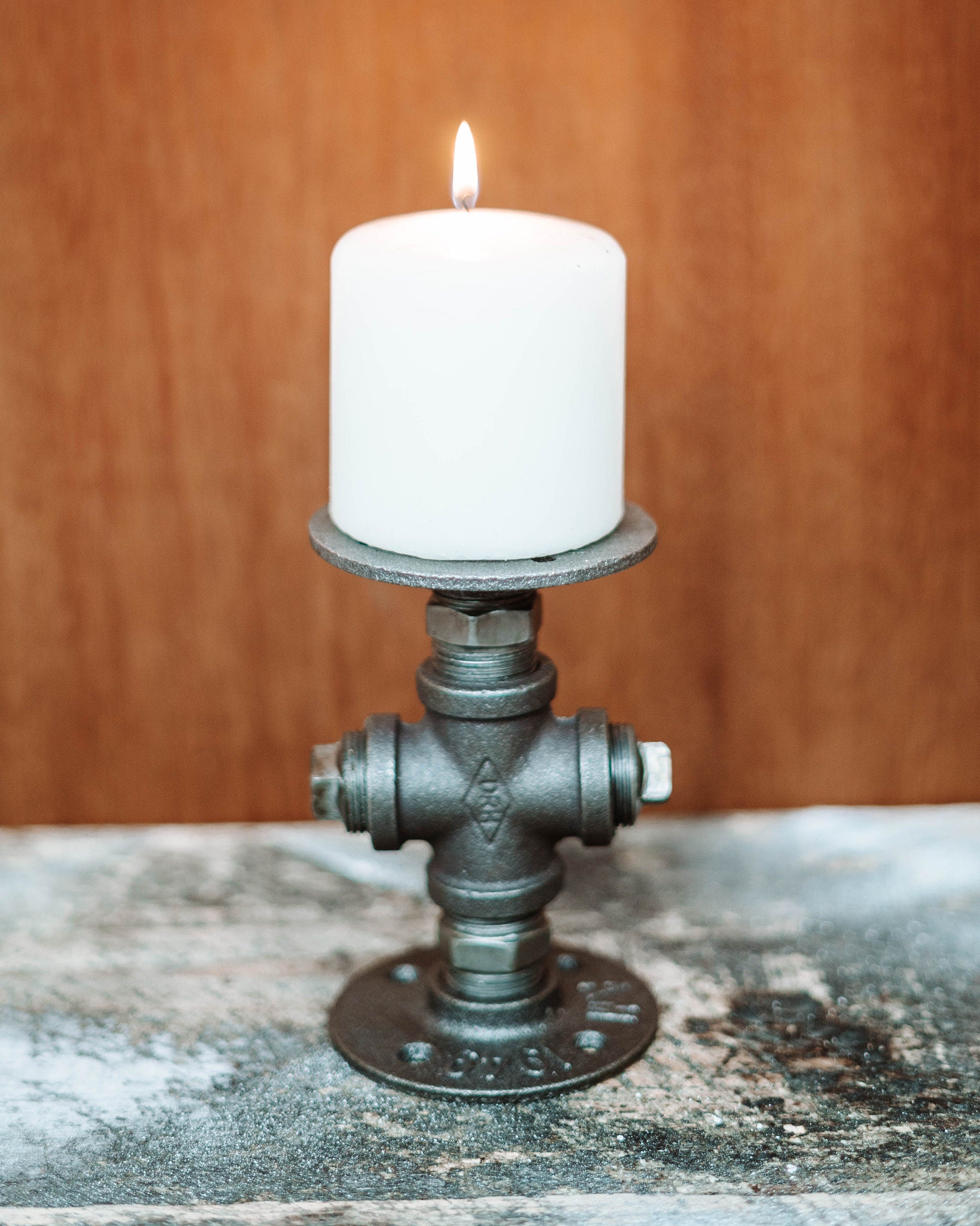 Candle Holder with a candle plate, showcasing its elegant and sophisticated design.