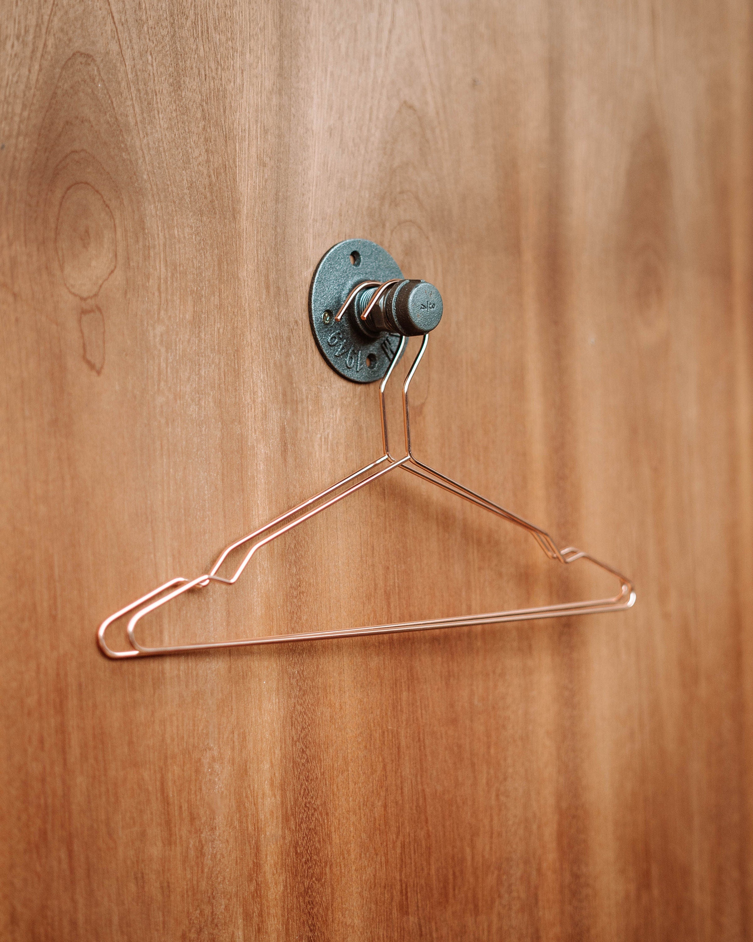 Versatile Coat Hooks, showcasing coat hangers, door hooks, and wall coat rack designs.