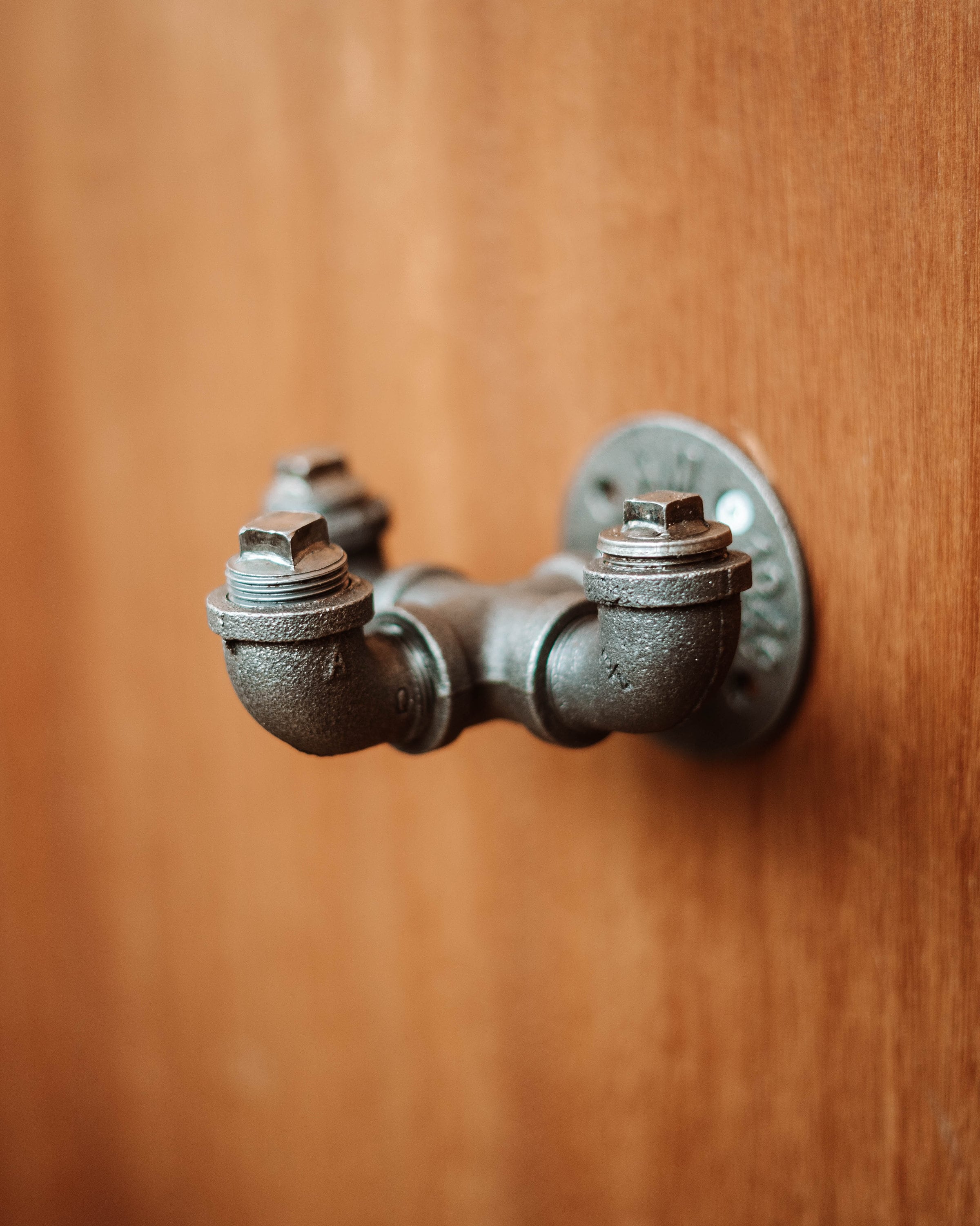 Sleek Coat Hooks, highlighting coat hangers, door hooks, and wall coat rack designs.