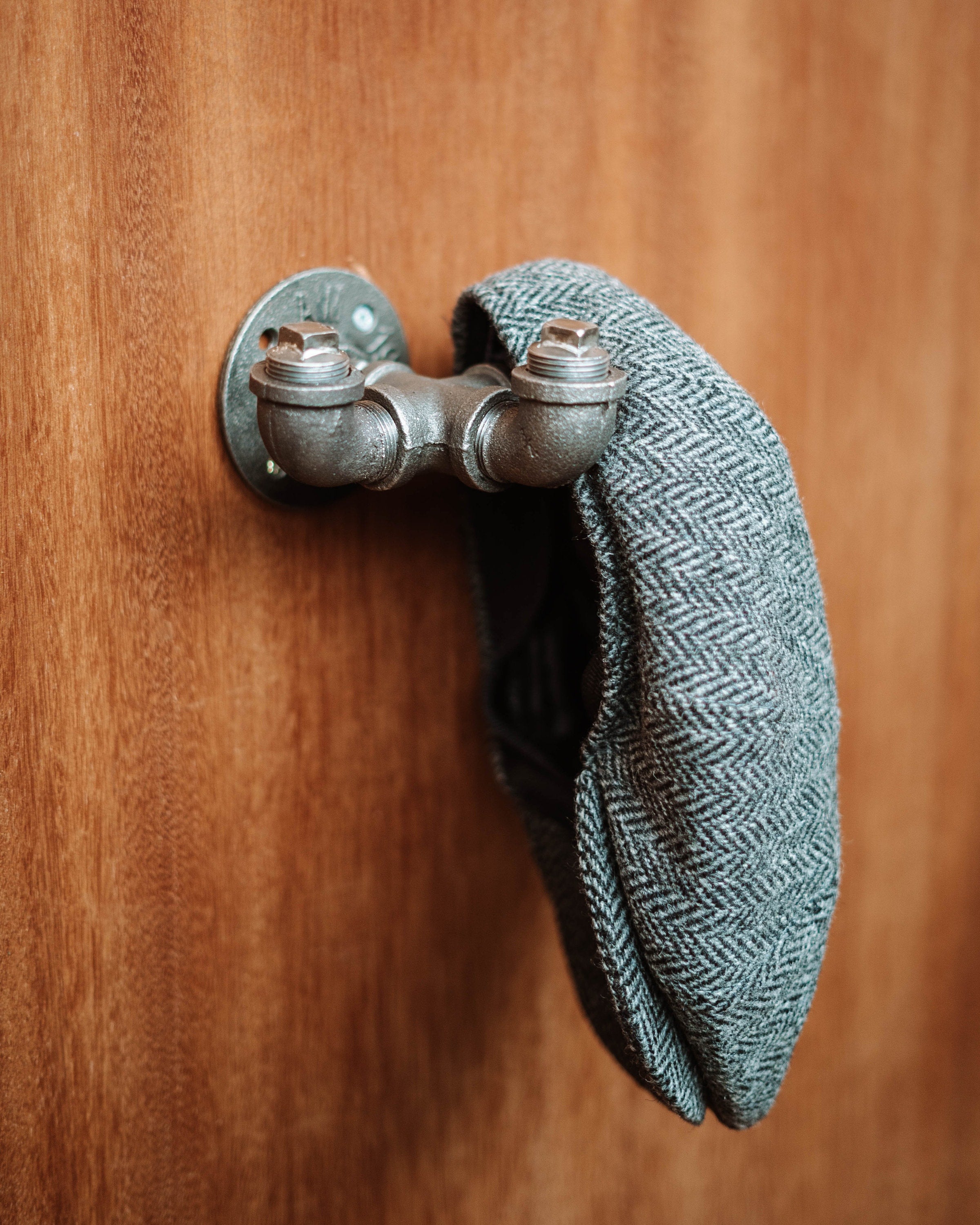 Sleek Coat Hooks, highlighting coat hangers, door hooks, and wall coat rack designs.