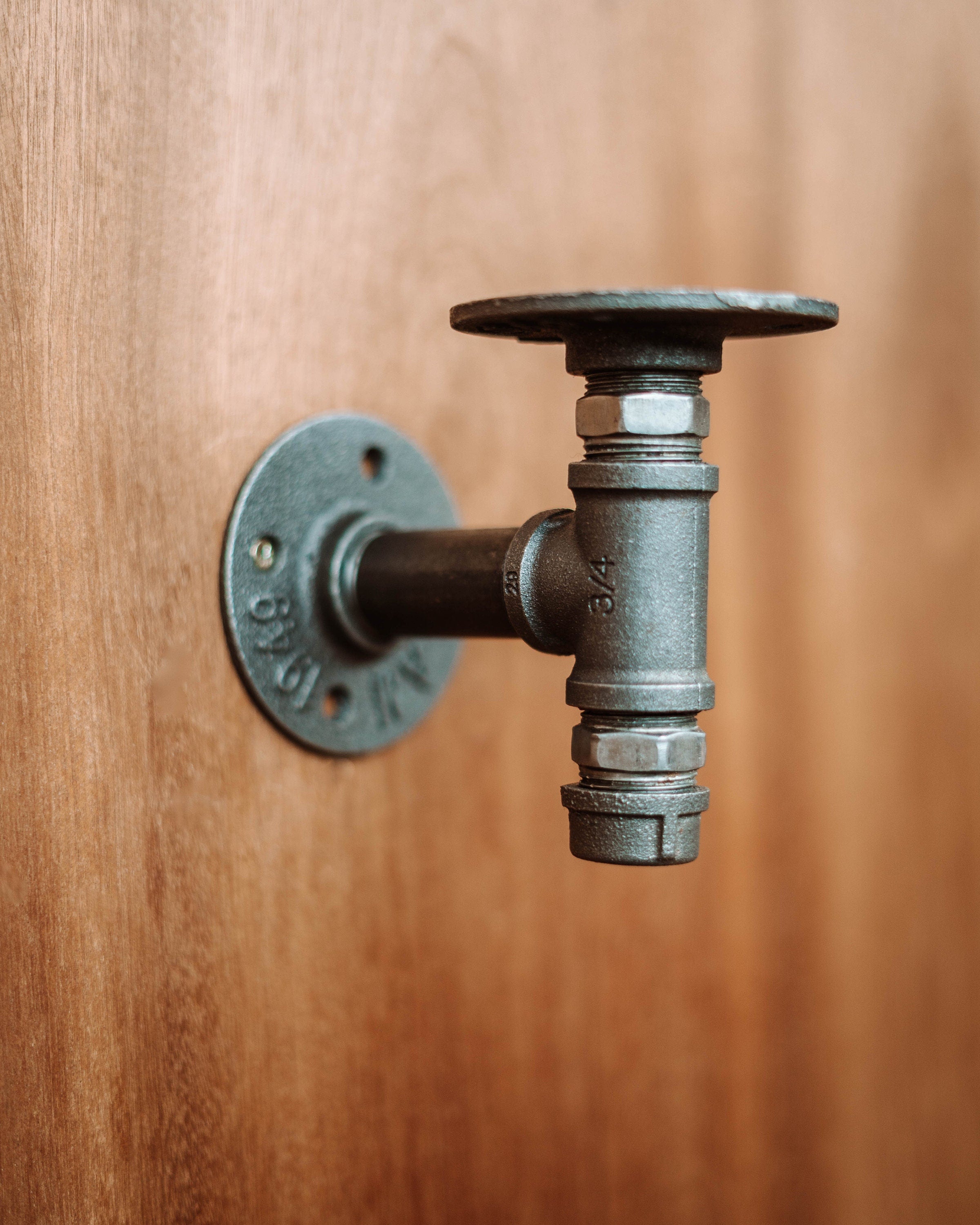 Wall Mounted Candle Holder with a candle plate, showcasing its elegant and sophisticated design.