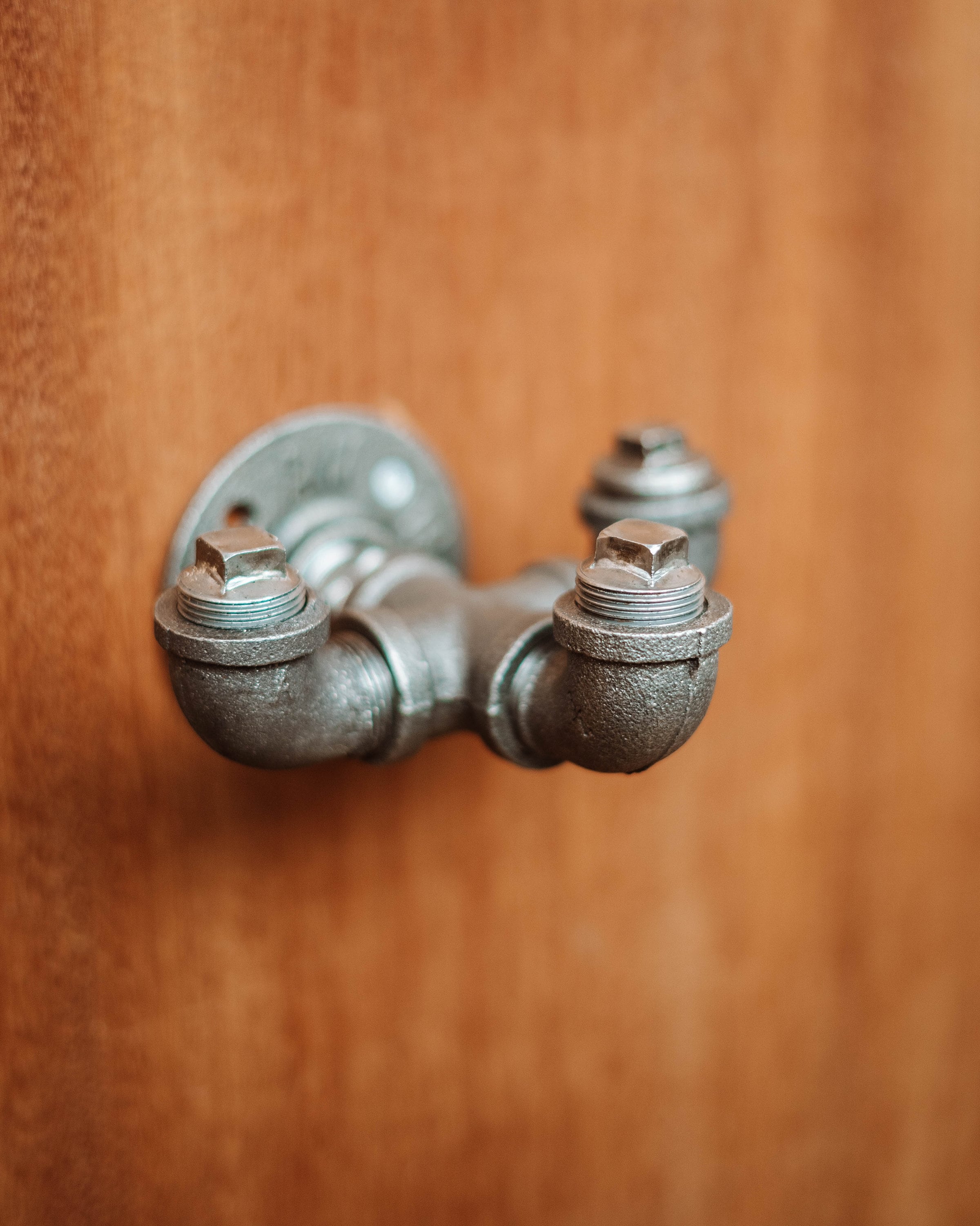 Sleek Coat Hooks, highlighting coat hangers, door hooks, and wall coat rack designs.