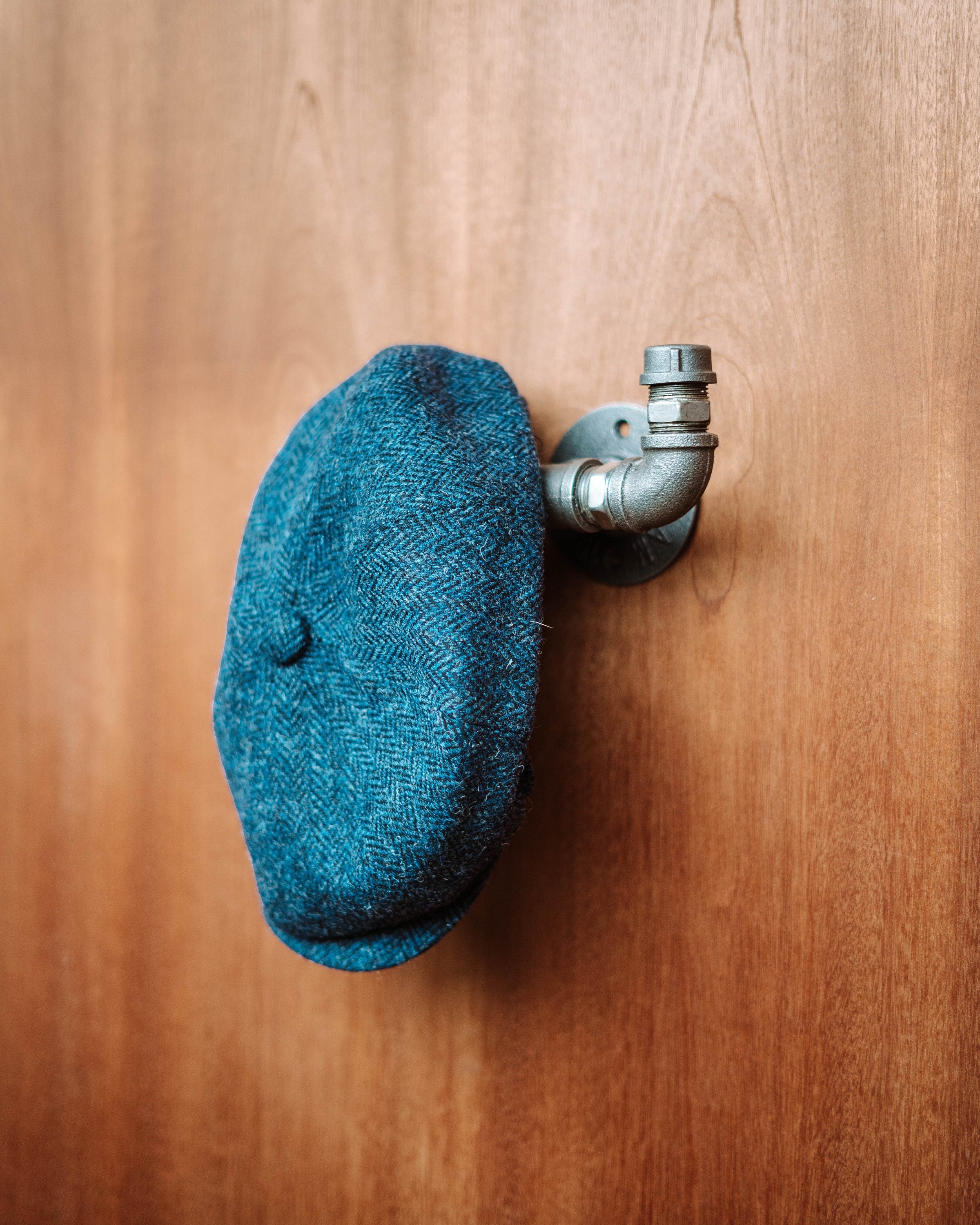 Industrial-style Pipe Coat Hanger Clothes Hook, ideal for organizing coats and accessories.