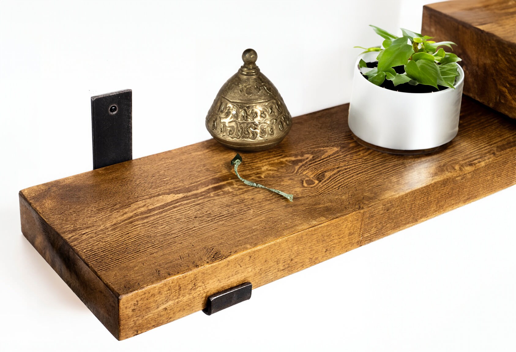 Sleek Chunky Wall Shelves with shelf brackets, highlighting a minimalist design