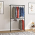 Minimalist wall-mounted clothing rack made from seamless square tube steel, featuring two hanging rails