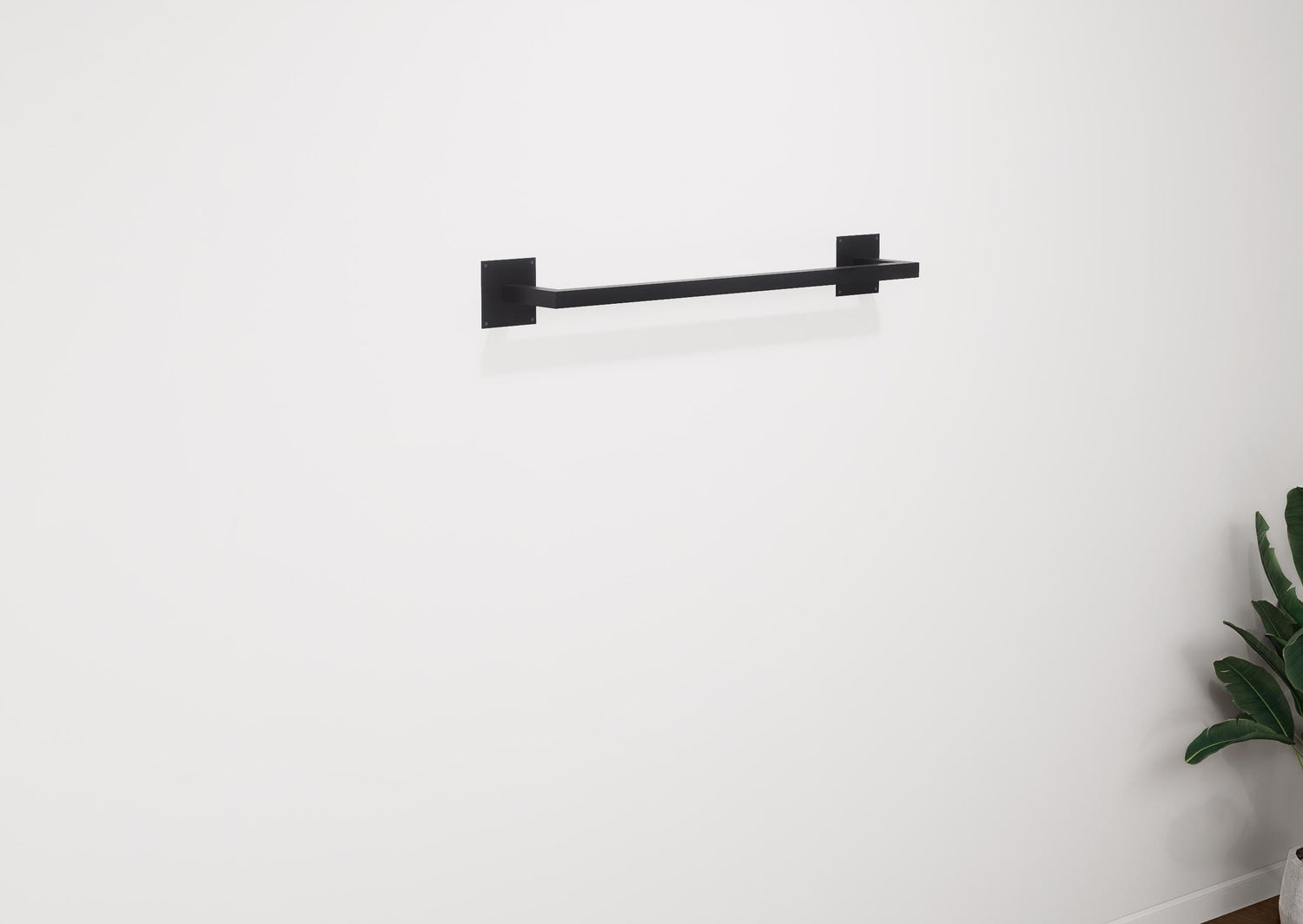 Minimalist square towel holder made from sturdy metal, featuring an industrial design. Ideal for organizing towels in the bathroom, adding a modern touch to decor. Durable and easy to install.