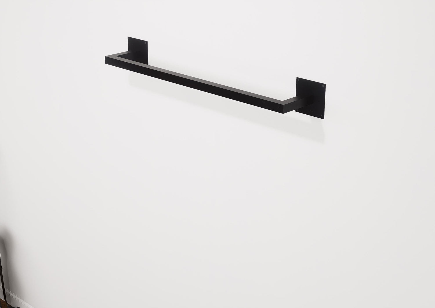 Minimalist square towel holder made from sturdy metal, featuring an industrial design. Ideal for organizing towels in the bathroom, adding a modern touch to decor. Durable and easy to install.
