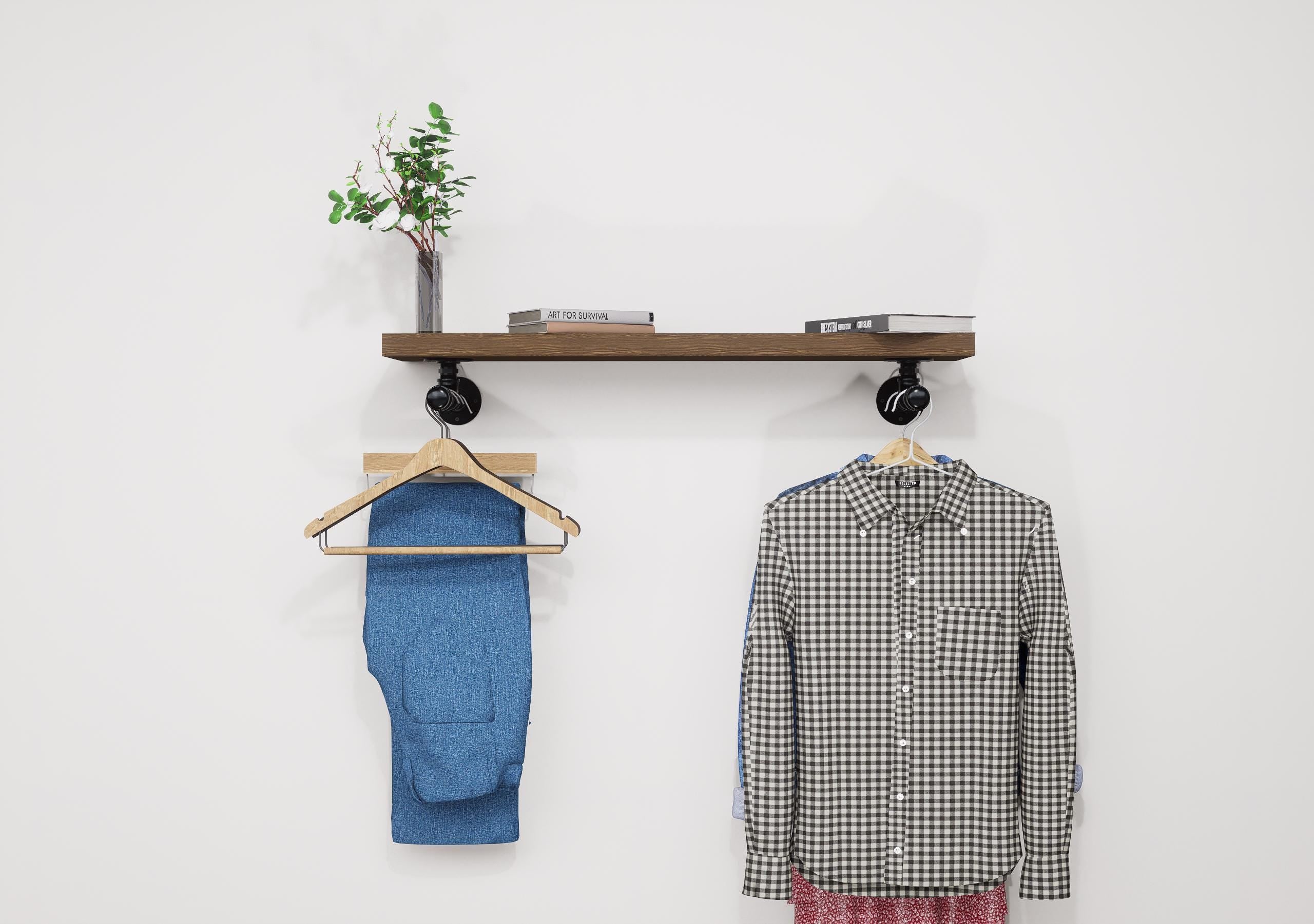 Wall-mounted industrial shelf with a wooden shelf and metal pipe fittings, featuring a hanging rail for clothes storage.