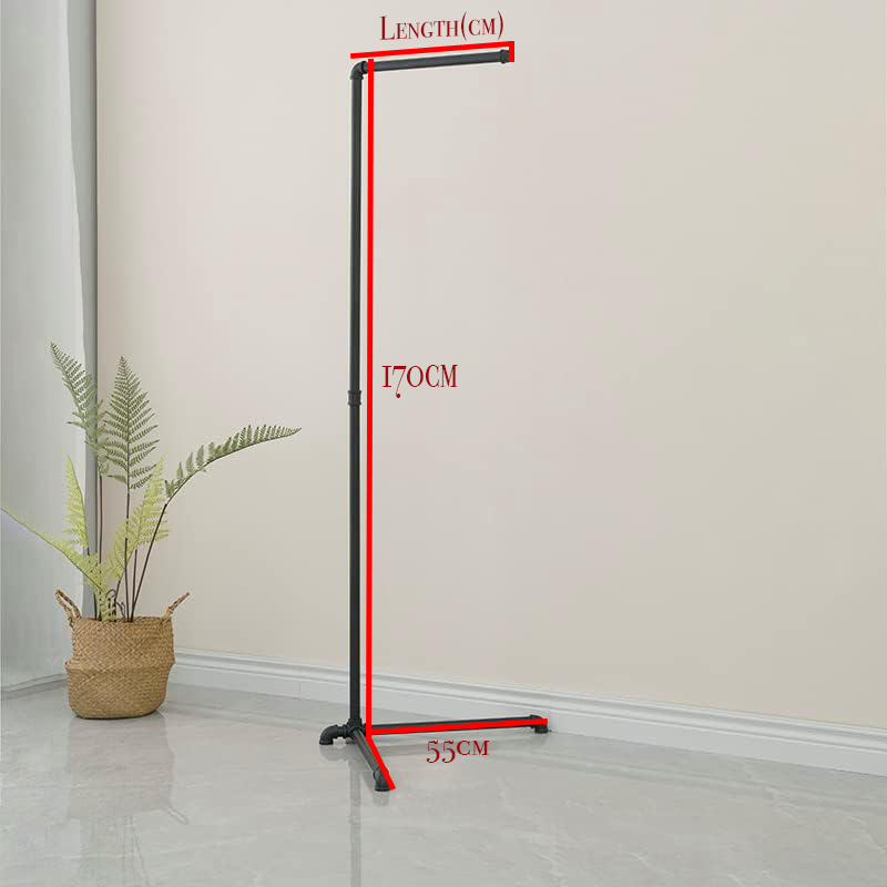 FODUE Industrial Pipe Clothes Rack, a free-standing gold finish hanging rod, suitable for organized closet storage without mounting or screws.