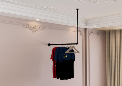a clothes rack with a t - shirt hanging from it