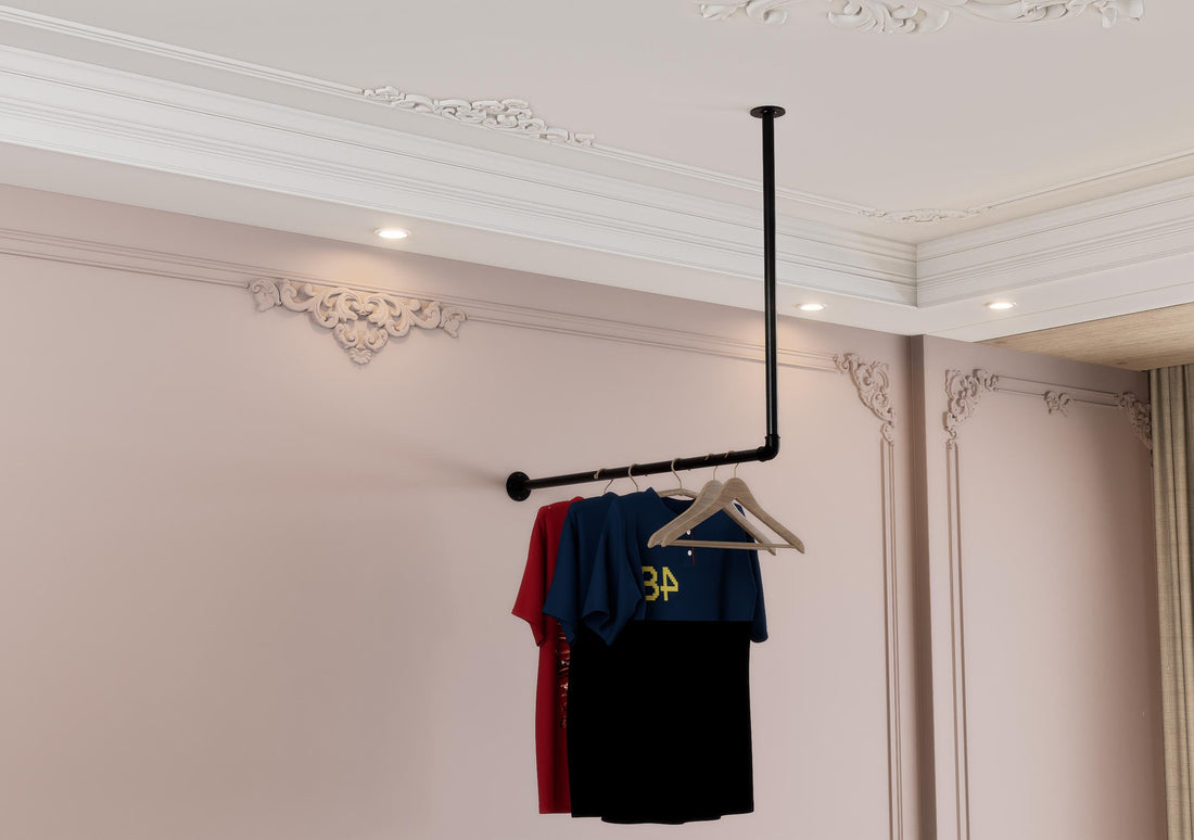 a rack with clothes hanging from it in a room