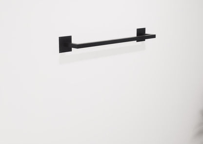 Minimalist square towel holder made from sturdy metal, featuring an industrial design. Ideal for organizing towels in the bathroom, adding a modern touch to decor. Durable and easy to install.