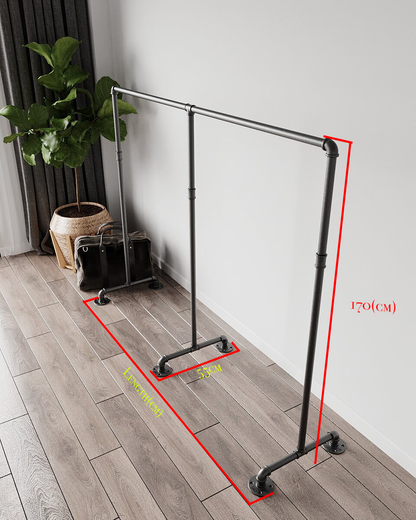 Zing Minimalist Freestanding Pipe Clothes Rack, displaying hanging garments, showcasing its modern and minimalist design.