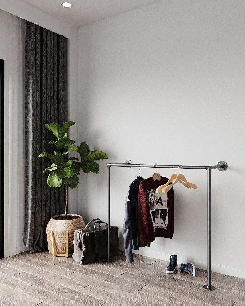 &quot;Argus Clothes Rack, a versatile and retro clothes rack and coat hanger, suitable for wall or floor mounting.&quot;