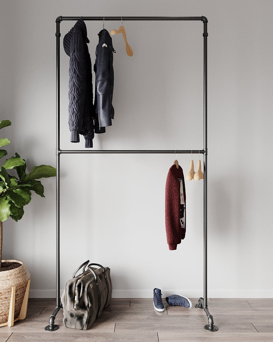 Artelos Freestanding Pipe Clothes Rack, a sturdy and vintage double clothes rack with two levels, suitable for hanging clothing and organizing accessories.