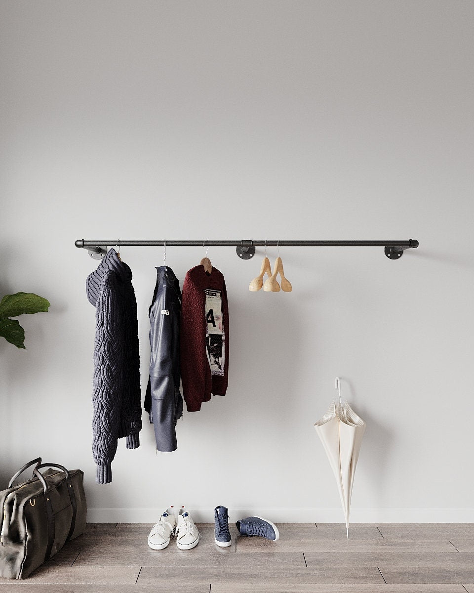 Caela Clothes Rail, a versatile clothing rail wall mounted, suitable for shop clothes display stands, storage clothing, and clothing hanging rail in various spaces.