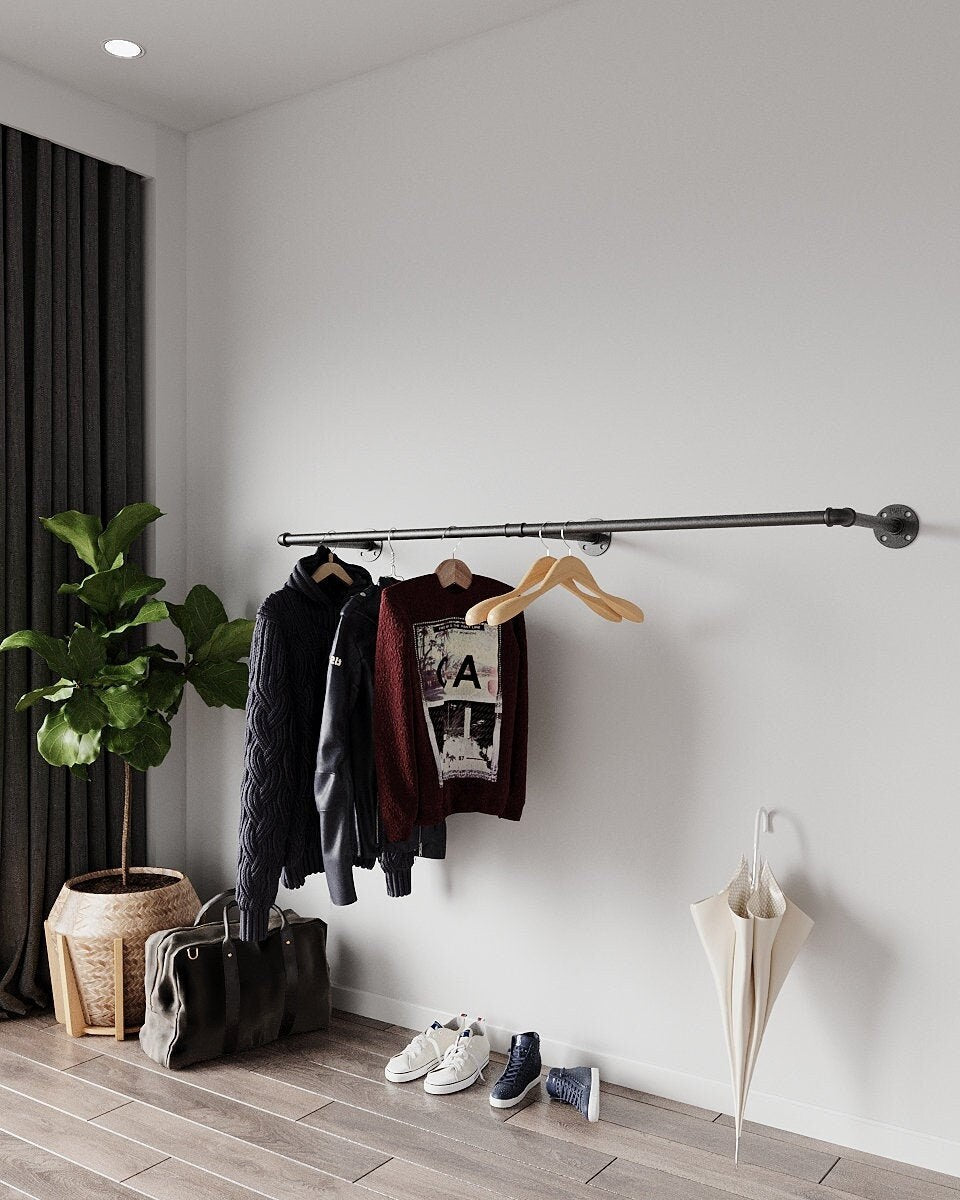 Caela Clothes Rail, a versatile clothing rail wall mounted, suitable for shop clothes display stands, storage clothing, and clothing hanging rail in various spaces.