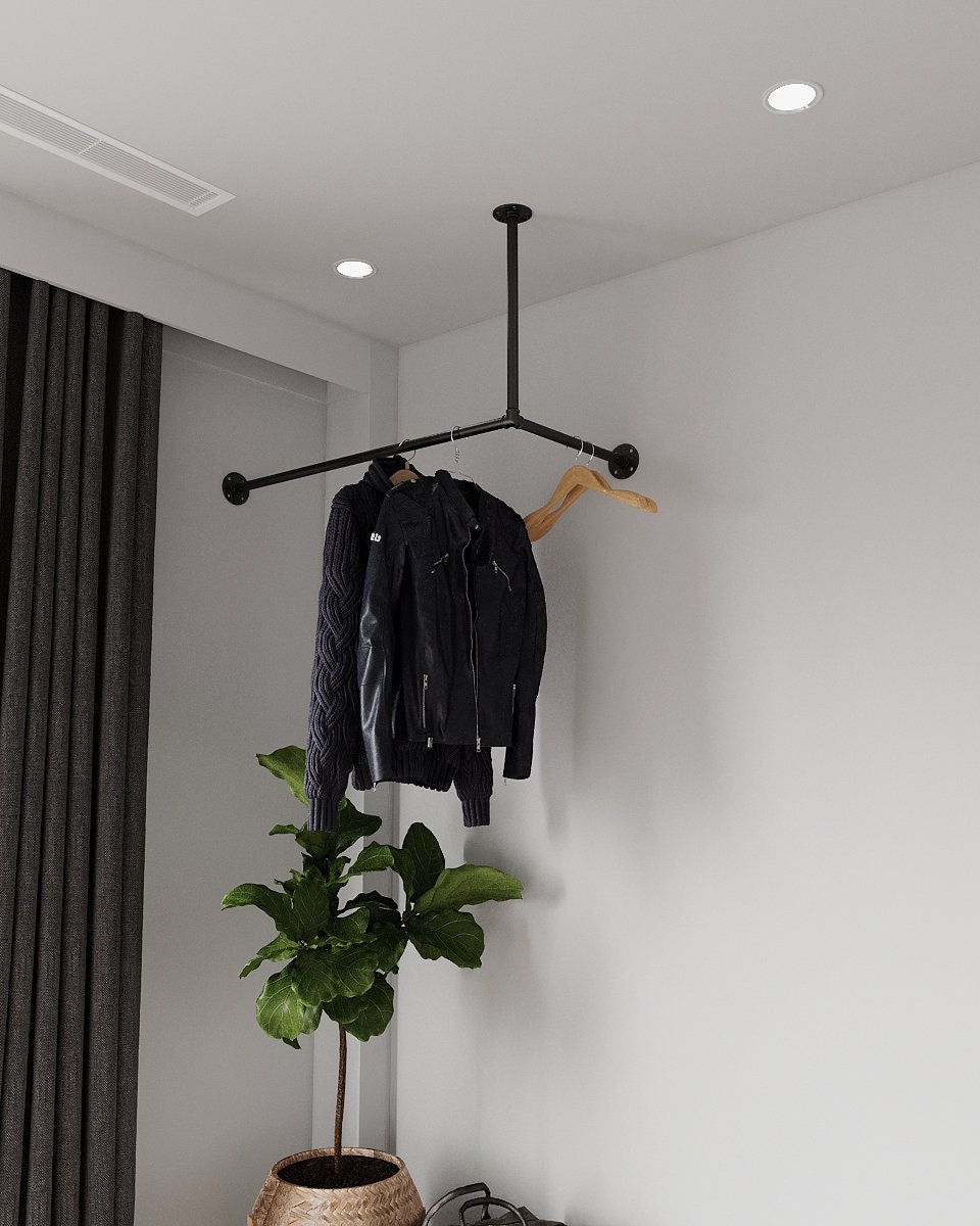 Sleek Ceiling Corner Clothes Racking system, suspended from the ceiling, offering a modern and space-saving solution for clothing storage.