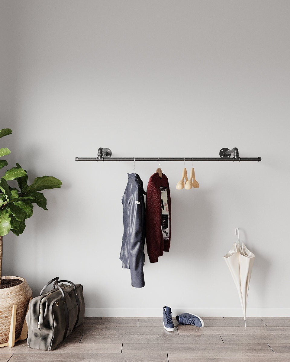 Industrial Pipe Wall Mounted Clothing Racks, a durable and versatile open wardrobe clothes storage solution, suitable for various settings.