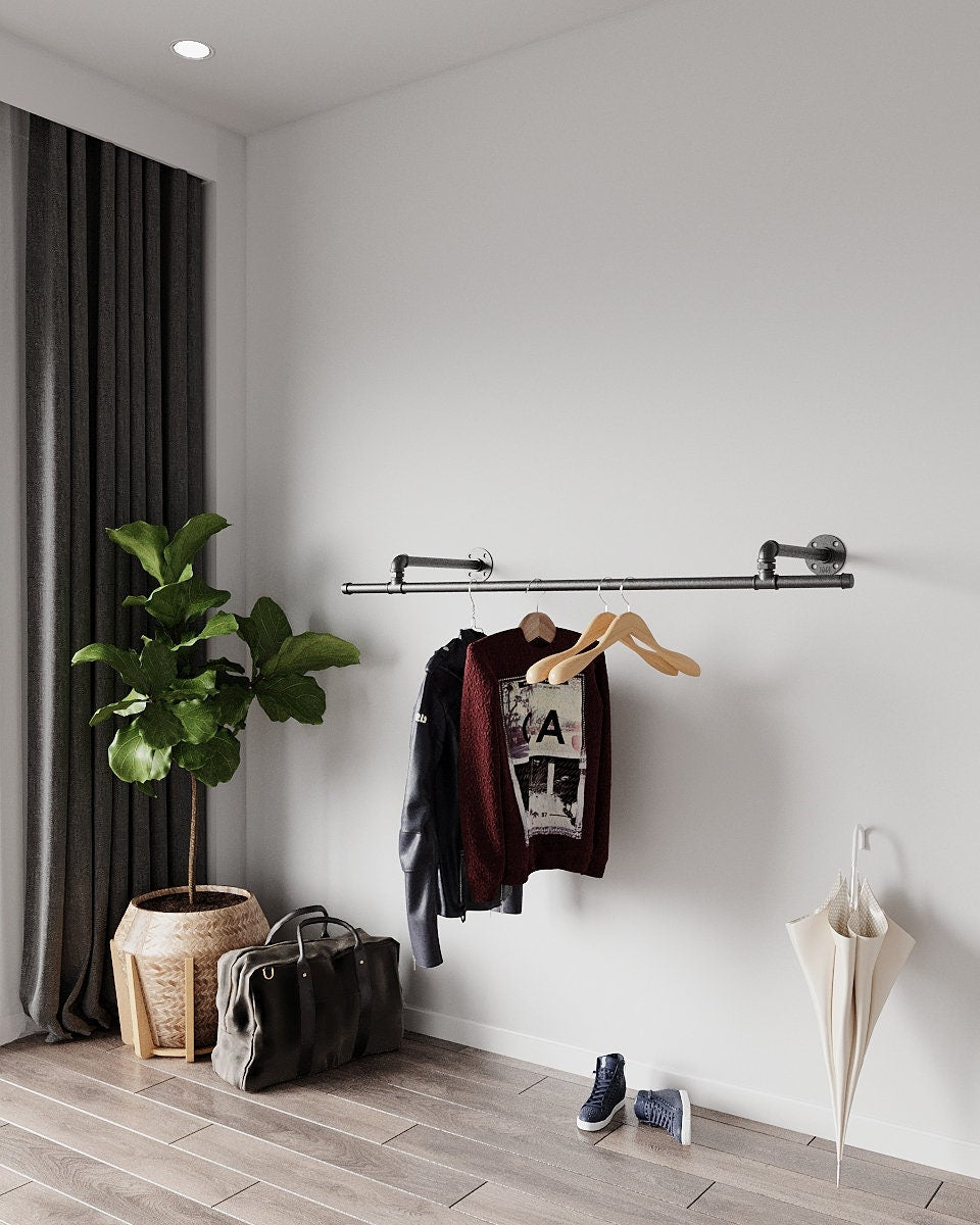 Industrial Pipe Wall Mounted Clothing Racks, a durable and versatile open wardrobe clothes storage solution, suitable for various settings.