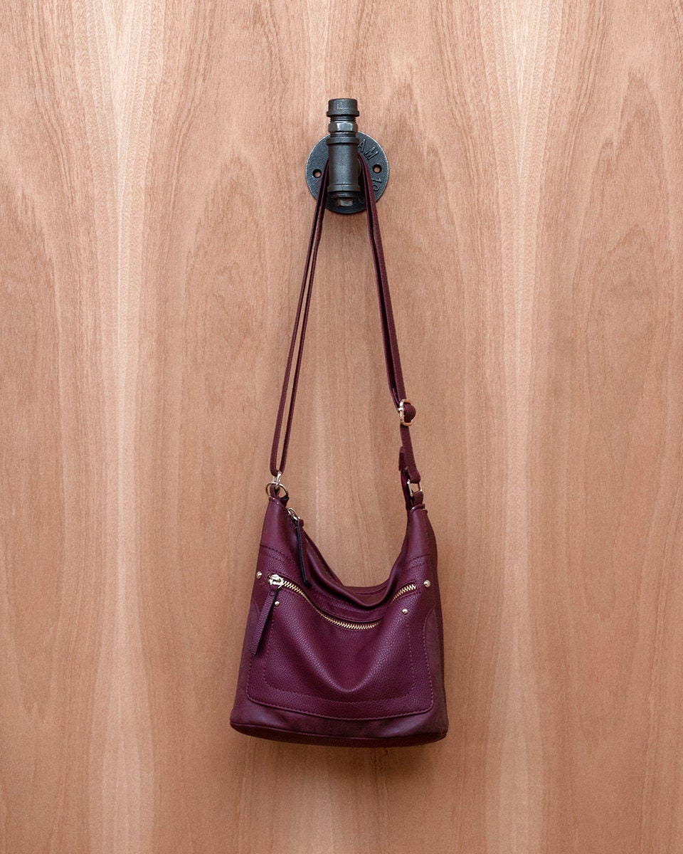 Sturdy Pipe Coat Hanger Clothes Hook with a rustic finish, perfect for hanging coats, hats, and scarves.