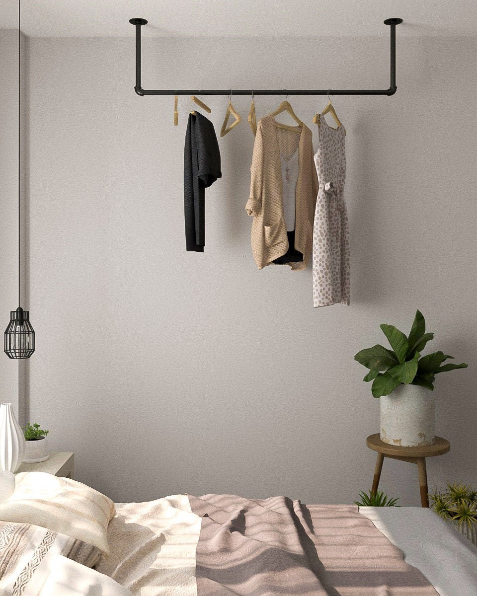 Durga Clothes Rail, a heavy-duty pipe ceiling mounted clothes rack, suitable for hanging and organizing 