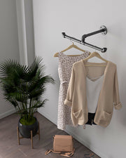 "Duofne Detachable Clothes Rail, a versatile malleable iron storing clothes rack, suitable for wall mounting in various residential and commercial settings