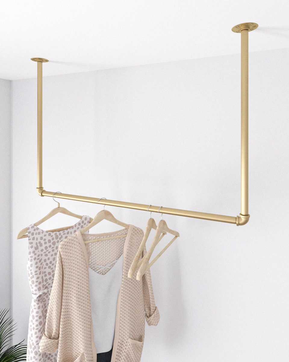 Golden Ceiling Clothes Rack - Elegant & Space-Saving Design ...