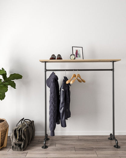 Minimalist Clothes Rail, showcasing its free-standing design and elegant appearance