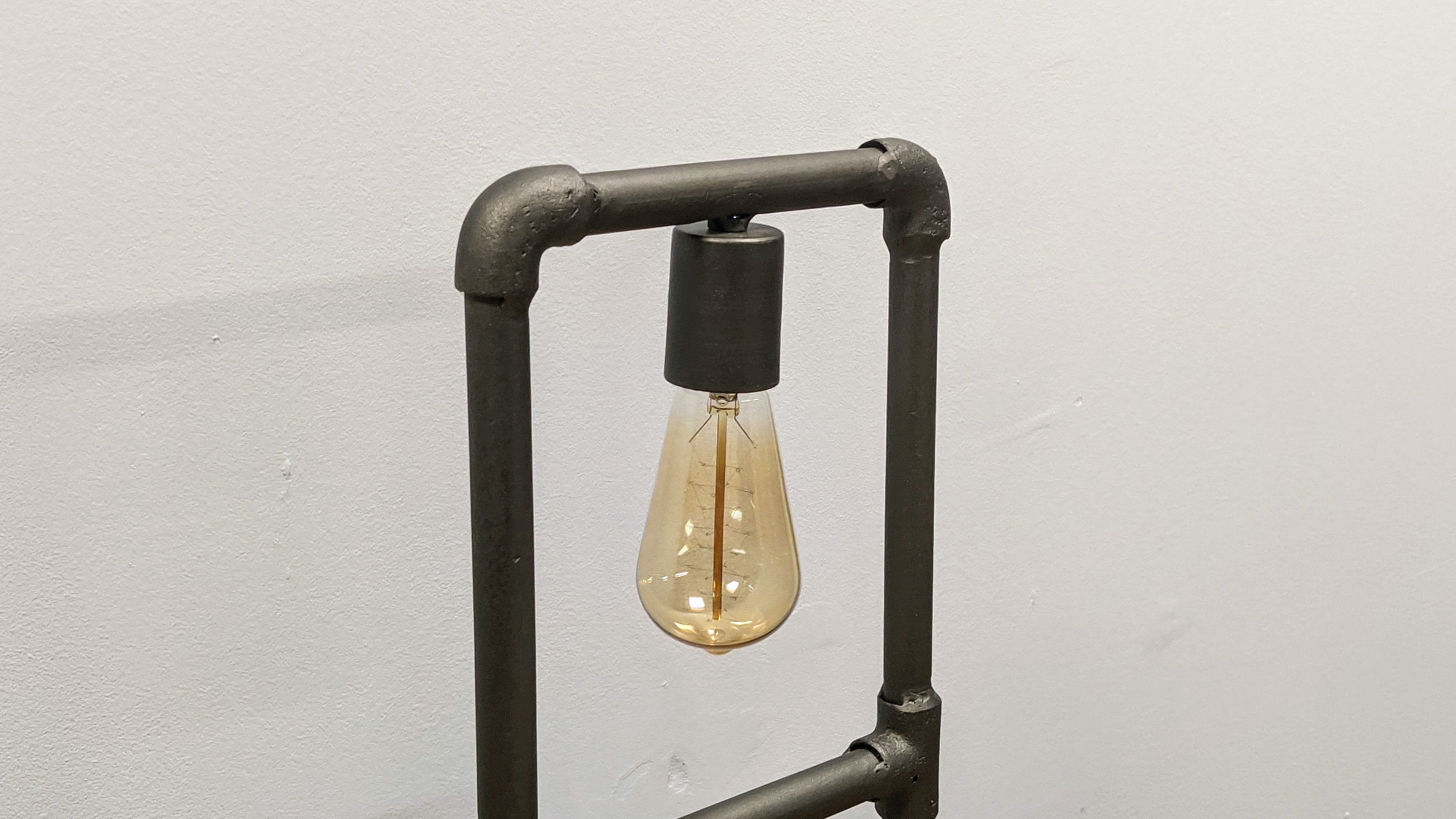 Side Table Lamp with industrial flair, perfect as a stylish table light.