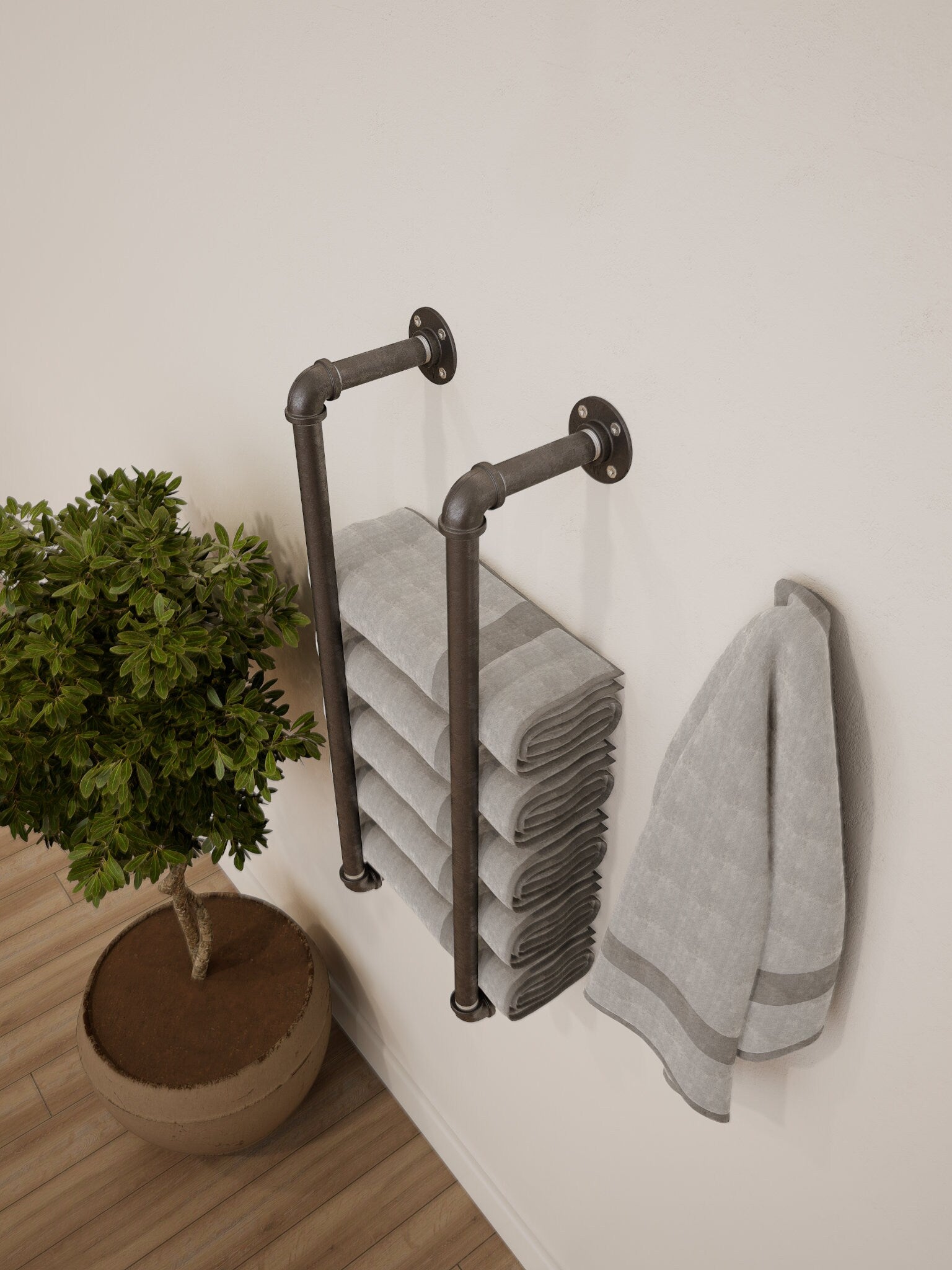 Wall Mounted Towel Holder Rack filled with towels, showcasing its versatile and space-saving design.