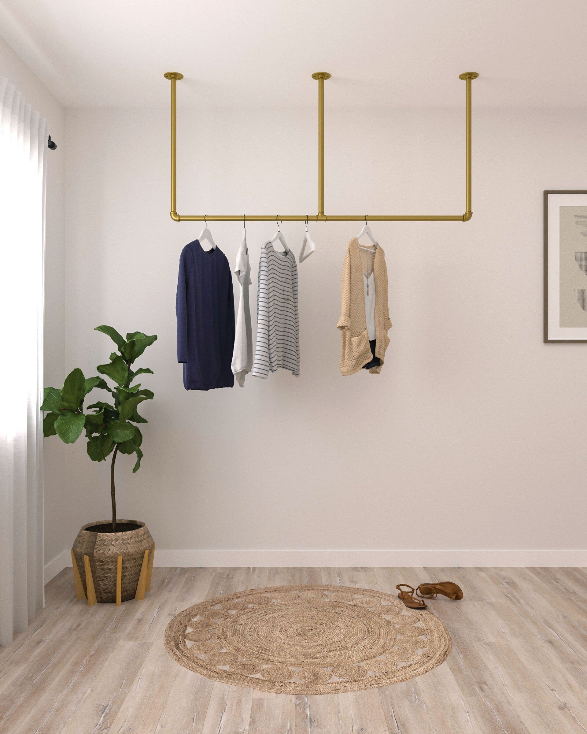 Bem Heavy Duty Minimalistic Clothes Rack, a ceiling-mounted shop display garment rail, suitable for various retail settings.