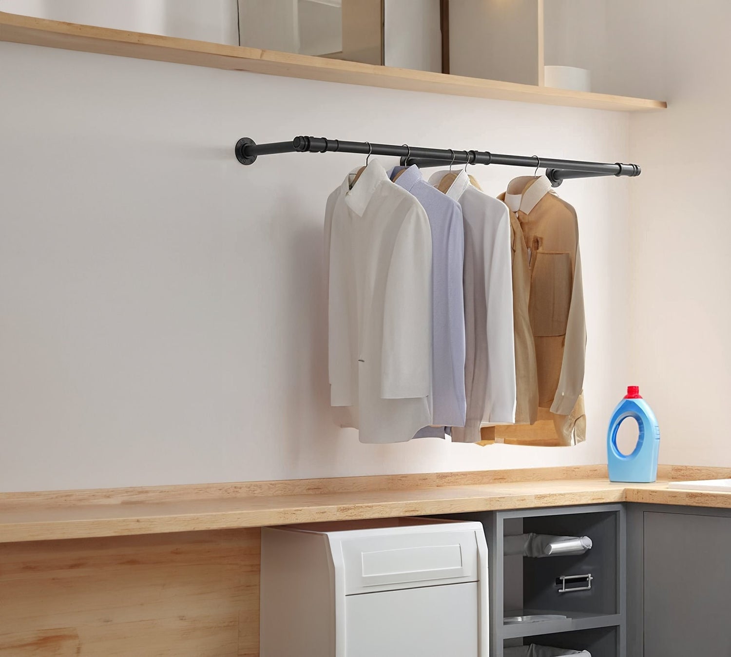 Retro wall-mounted hanging clothing rack, showcasing its design and capacity to hold many pieces of clothing.